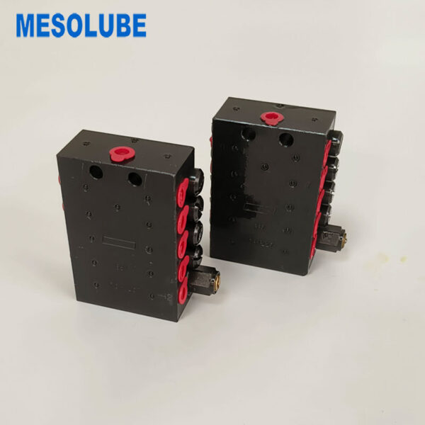 The metering devices can be equipped with an indicator pin which is connected to the piston and moves back and forth during lubricant distribution.  If there is a blockage in the system,